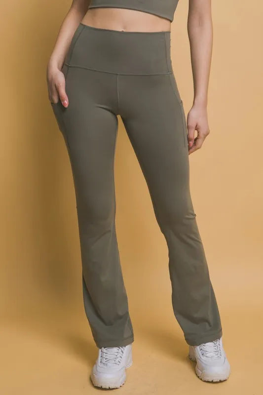 Flare Leggings with Side Pockets - Moss shown on a model